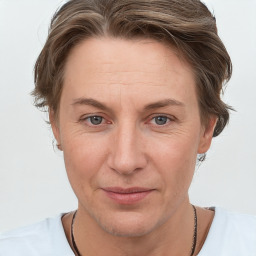 Joyful white adult female with short  brown hair and grey eyes