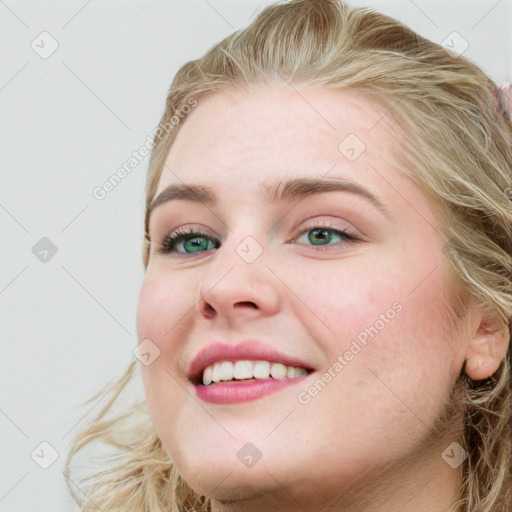 Joyful white young-adult female with long  brown hair and blue eyes