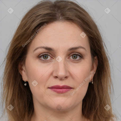 Joyful white adult female with medium  brown hair and grey eyes