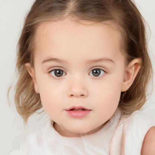 Neutral white child female with medium  brown hair and brown eyes