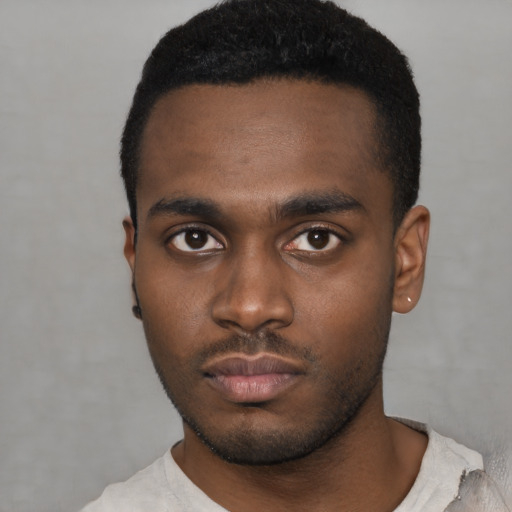 Neutral black young-adult male with short  black hair and brown eyes