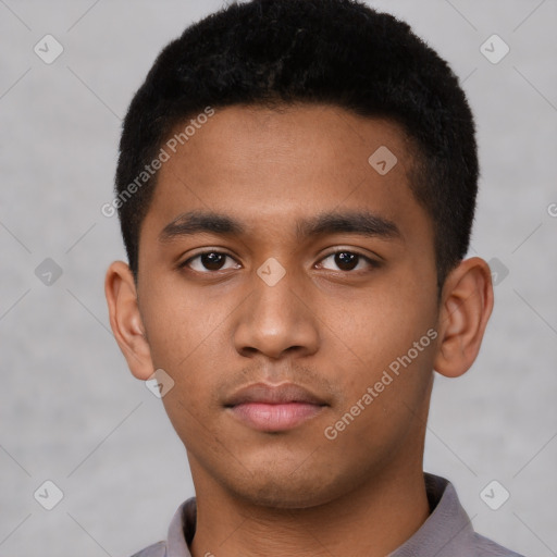 Neutral latino young-adult male with short  brown hair and brown eyes