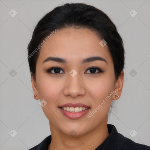 Joyful asian young-adult female with short  black hair and brown eyes