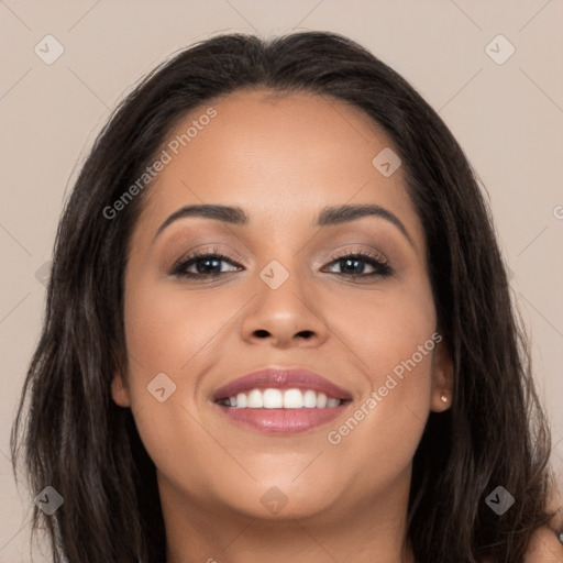 Joyful white young-adult female with long  black hair and brown eyes