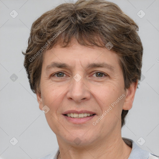 Joyful white adult male with short  brown hair and grey eyes