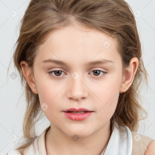 Joyful white child female with medium  brown hair and brown eyes