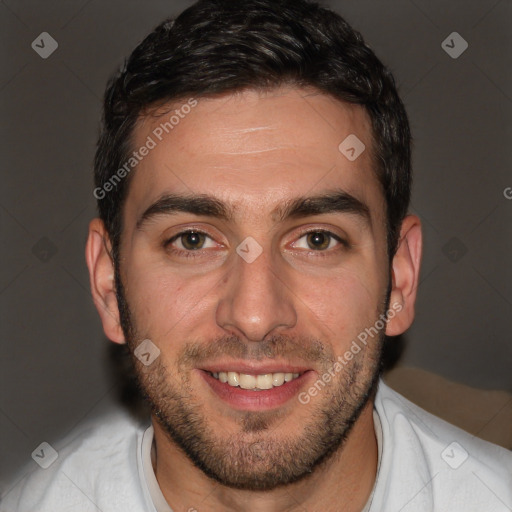 Joyful white adult male with short  brown hair and brown eyes