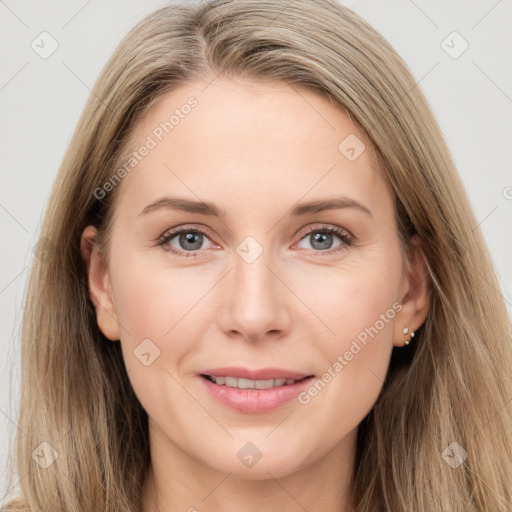 Joyful white young-adult female with long  brown hair and grey eyes