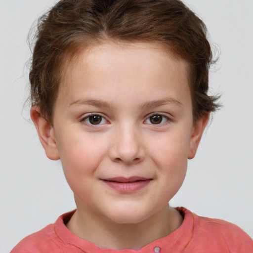 Joyful white child female with short  brown hair and brown eyes