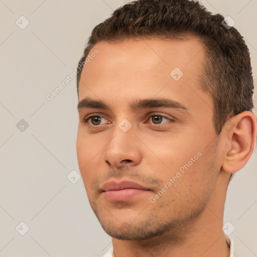 Neutral white young-adult male with short  brown hair and brown eyes