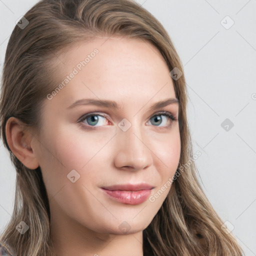 Joyful white young-adult female with long  brown hair and blue eyes