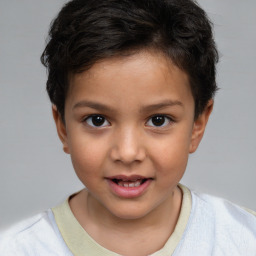 Joyful white child female with short  brown hair and brown eyes