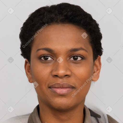 Joyful black young-adult female with short  black hair and brown eyes