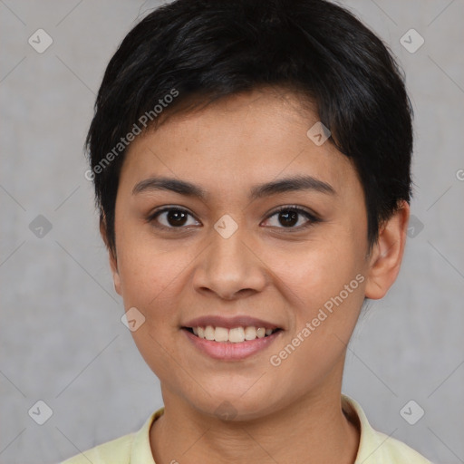 Joyful asian young-adult female with short  black hair and brown eyes