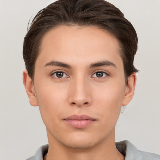 Neutral white young-adult male with short  brown hair and brown eyes