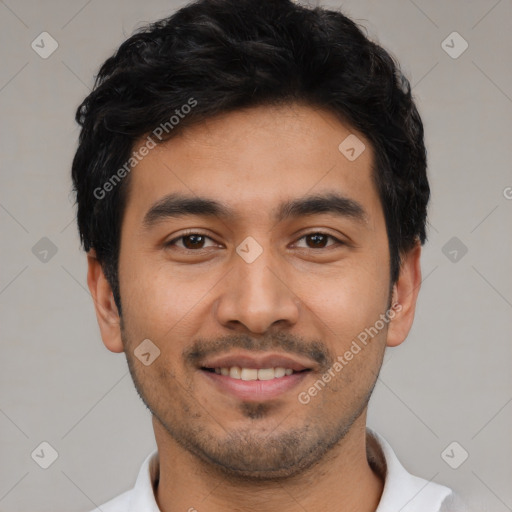 Joyful latino young-adult male with short  black hair and brown eyes