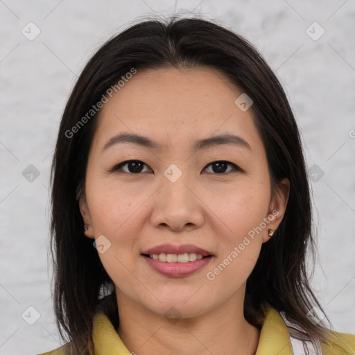 Joyful asian young-adult female with medium  brown hair and brown eyes