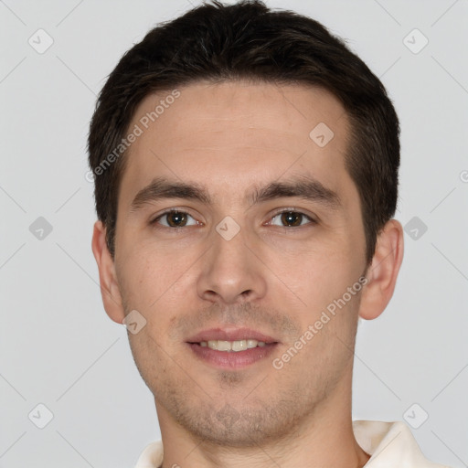 Joyful white young-adult male with short  brown hair and brown eyes