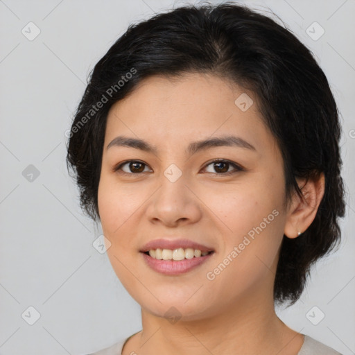 Joyful white young-adult female with medium  brown hair and brown eyes