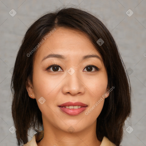 Joyful asian young-adult female with medium  brown hair and brown eyes