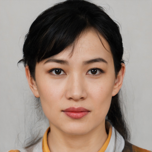 Neutral asian young-adult female with medium  black hair and brown eyes