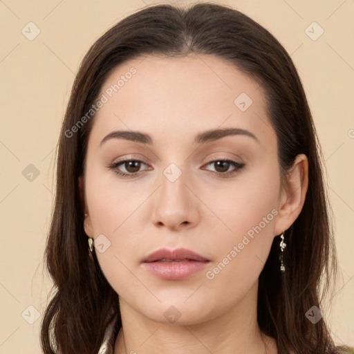 Neutral white young-adult female with long  brown hair and brown eyes