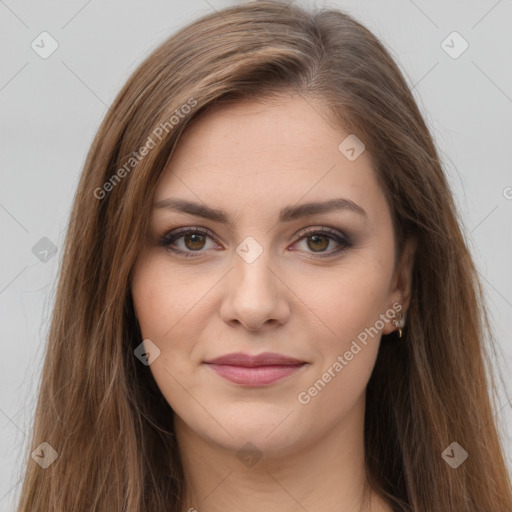 Joyful white young-adult female with long  brown hair and brown eyes