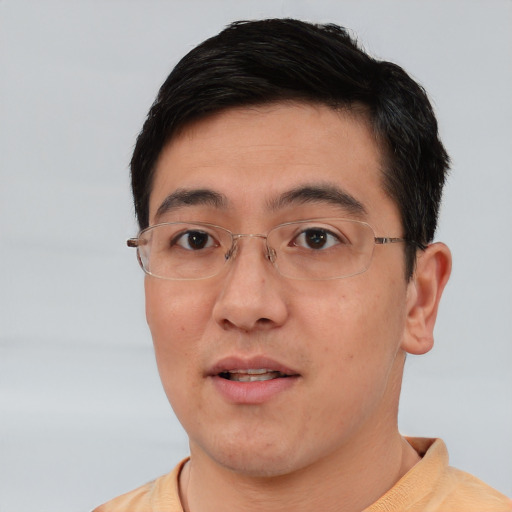 Neutral asian young-adult male with short  black hair and brown eyes