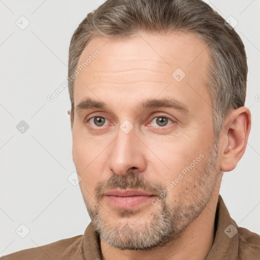 Neutral white adult male with short  brown hair and brown eyes