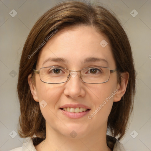 Joyful white adult female with medium  brown hair and brown eyes