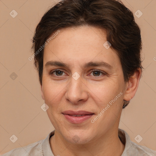 Joyful white adult female with short  brown hair and brown eyes