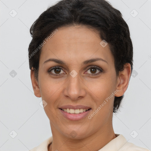 Joyful white adult female with short  brown hair and brown eyes