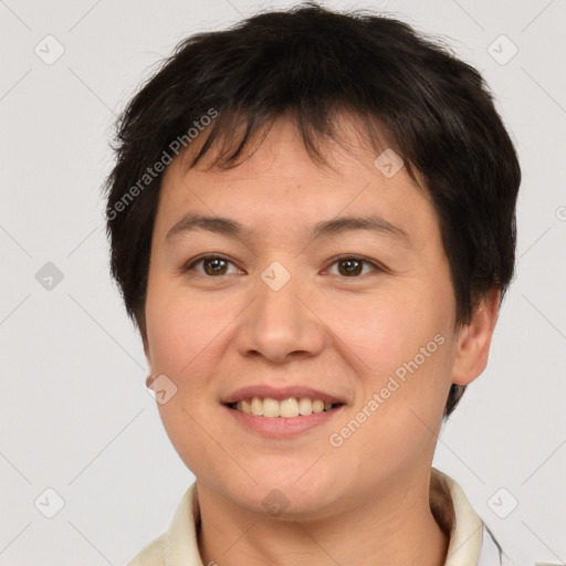 Joyful white young-adult female with short  brown hair and brown eyes