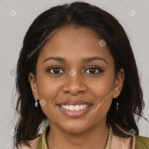 Joyful black young-adult female with medium  brown hair and brown eyes