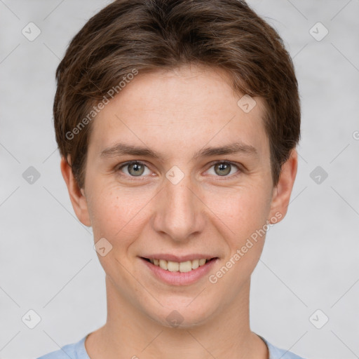 Joyful white young-adult female with short  brown hair and grey eyes