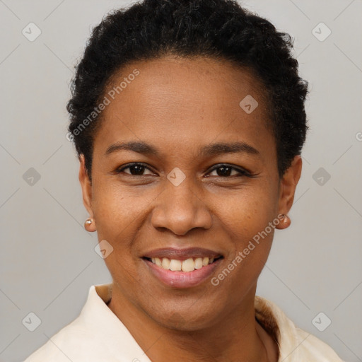 Joyful black young-adult female with short  black hair and brown eyes