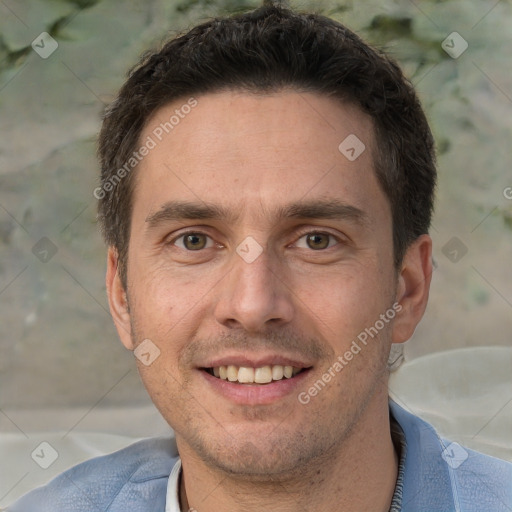 Joyful white adult male with short  brown hair and brown eyes