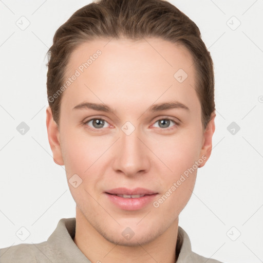 Joyful white young-adult female with short  brown hair and grey eyes