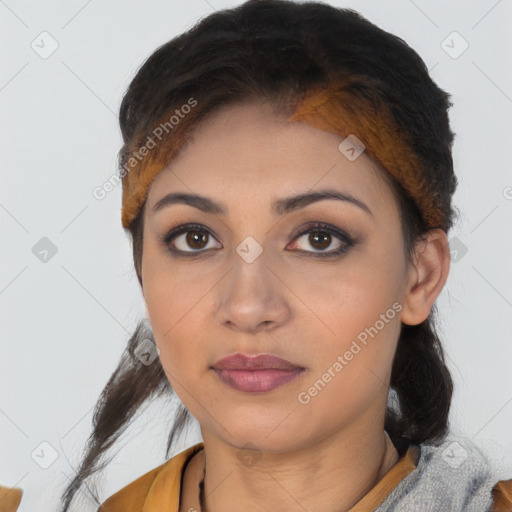 Joyful latino young-adult female with short  brown hair and brown eyes