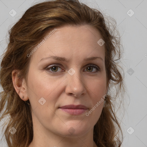 Joyful white adult female with long  brown hair and brown eyes