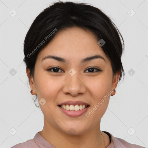 Joyful asian young-adult female with short  black hair and brown eyes