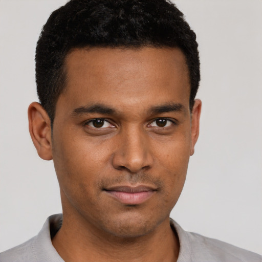 Neutral black young-adult male with short  brown hair and brown eyes