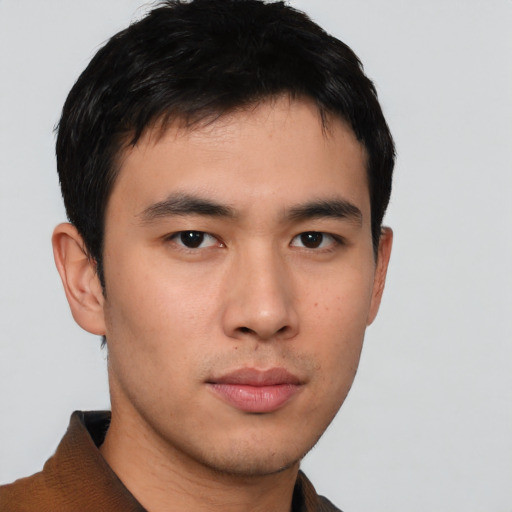 Neutral asian young-adult male with short  brown hair and brown eyes