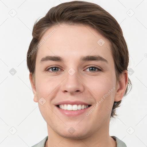 Joyful white young-adult female with short  brown hair and grey eyes