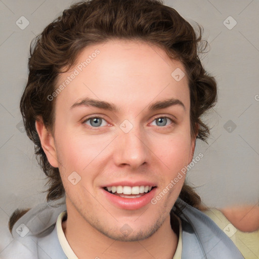 Joyful white young-adult female with short  brown hair and blue eyes