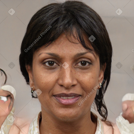 Joyful white adult female with medium  brown hair and brown eyes