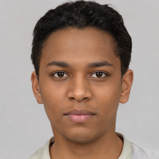 Neutral black young-adult male with short  brown hair and brown eyes