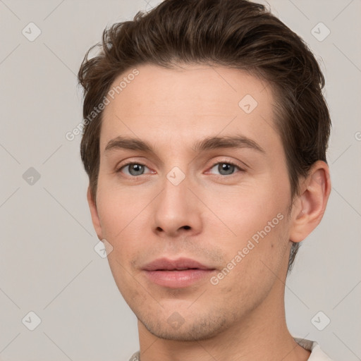 Neutral white young-adult male with short  brown hair and grey eyes