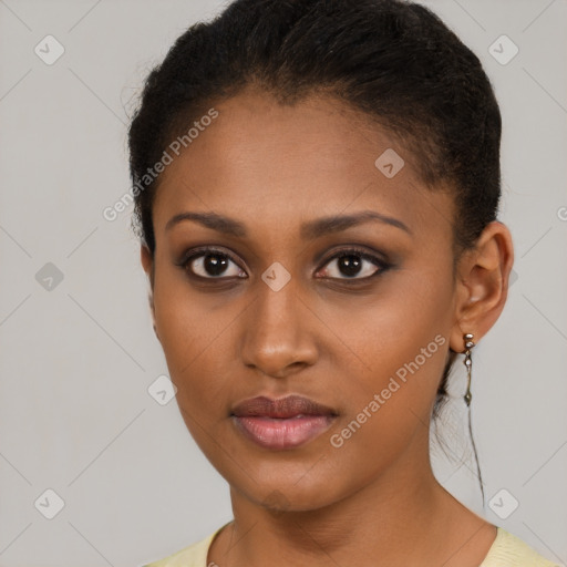 Neutral black young-adult female with short  brown hair and brown eyes