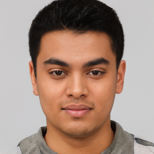 Neutral latino young-adult male with short  black hair and brown eyes